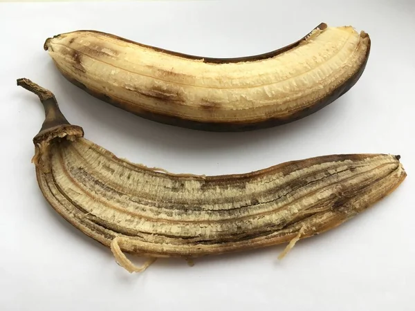 Egy Nagy Banán Egy Héj Fekszik Mellette Absztrakt Minimalista Háttér — Stock Fotó
