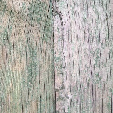 Kabartmalı ahşap yüzey kabuk soyulmuş boyayla kaplı. Soyut arkaplan.