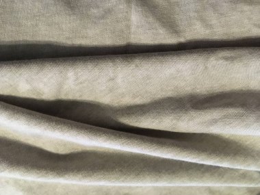 Kumaş dokusu yüzeyi. Gri ile soyut minimalist arkaplan.