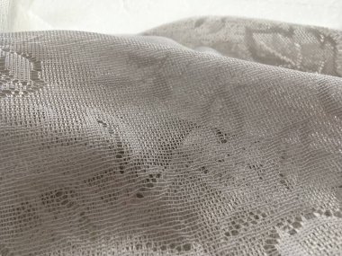 Dokusal soyut perdeler. Minimalist bir geçmiş. Kumaş yüzeyi.