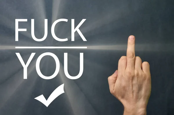 Middle finger of a European man on a dark background with the inscription in English Fuck you with rays behind and a check mark