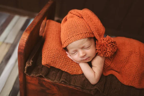 Cute Newborn Baby Hat Brown Bed Orange Pillow Sleeping Baby — Stock Photo, Image