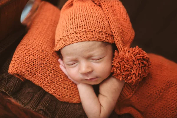 Cute Newborn Baby Hat Brown Bed Orange Pillow Sleeping Baby — Stock Photo, Image