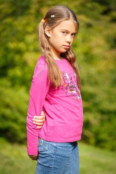 Girl in a Summer Park Stock Photo