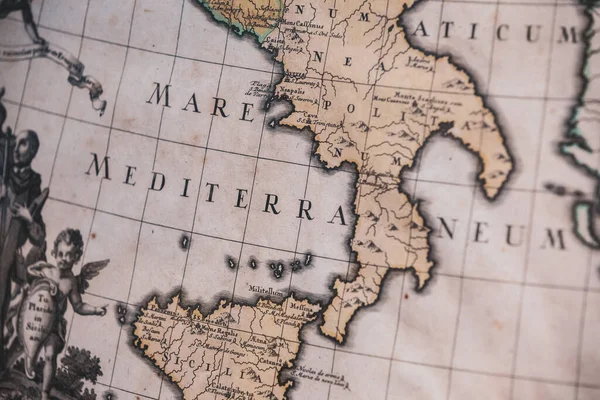Ancient map of the Mediterranean Sea of Italy. Ancient Latin language, Italian peninsula. Selective focus. Inside the monastery of Montecassino in Italy.