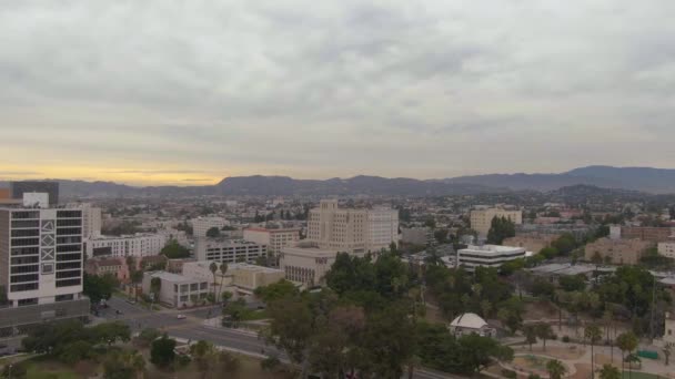 LOS ANGELES, USA - DECEMBER 1, 2018: Los Angeles City. California, USA. Aerial View from MacArthur Park. Drone Flies Upwards and Forward. — Stock Video