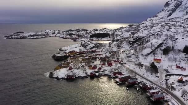 Nusfjord Fishing Village and Mountains in Winter. Lofoten Islands, Norway. Aerial View — Stock Video
