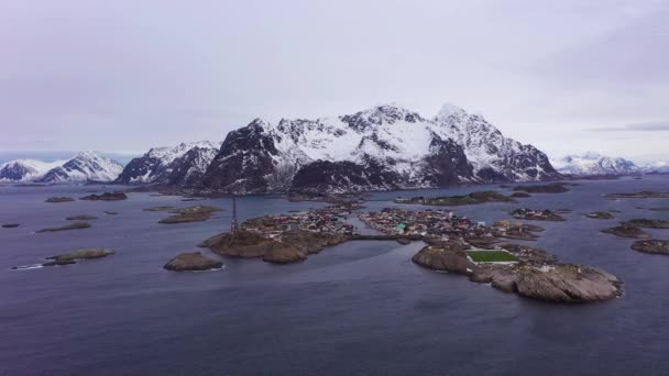 Henningsvaer Village and Mountains in Winter. Lofoten, Norway. Aerial View — Stock Video
