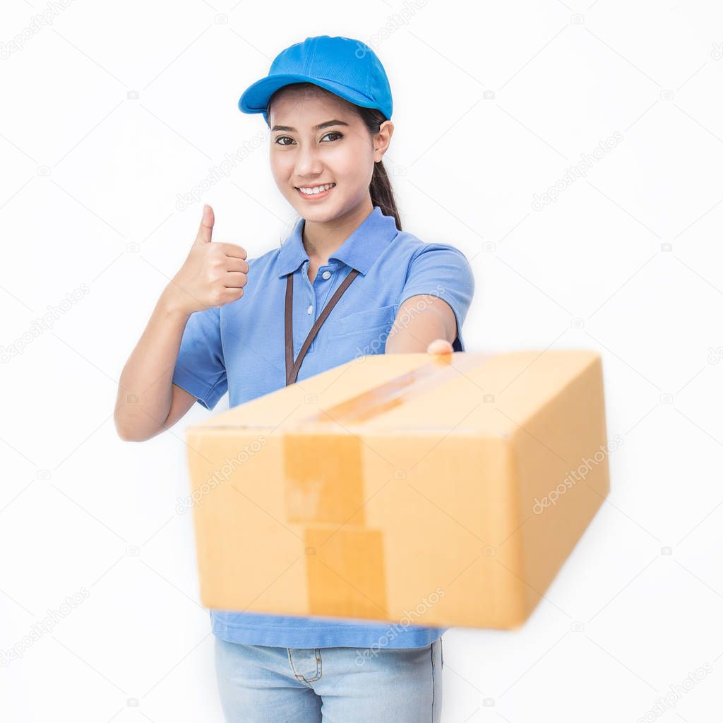 Portrait of happy delivery asian woman in blue form holding cardboard boxes isolated on white background
