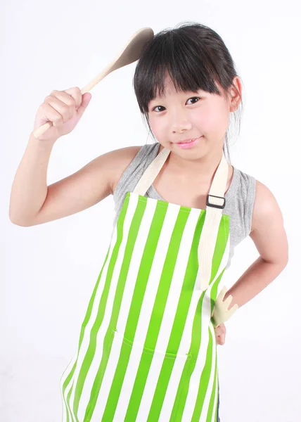 Little Asian Girl Kitchen Tools Wearing Green Apron Looking Isolated — Stock Photo, Image