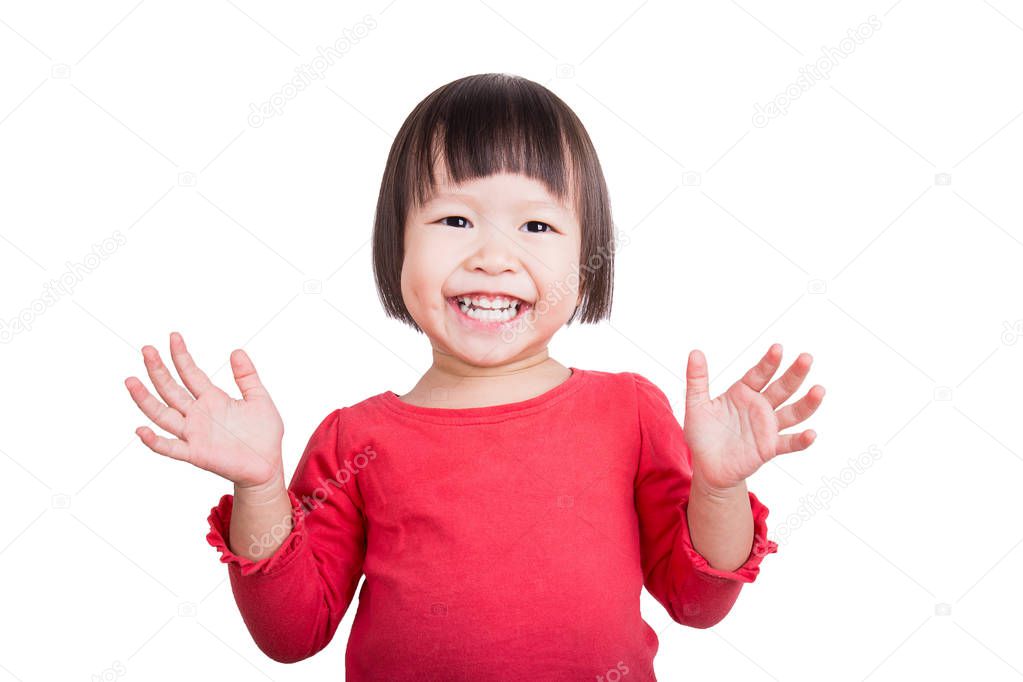Portrait of little cute asian girl looking and posing at camera isolated on white background 