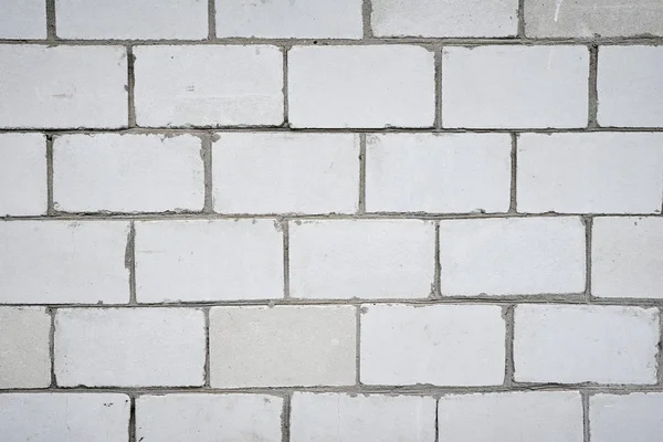 Fundo da parede branca, fecho. Textura de tijolo abstrato — Fotografia de Stock