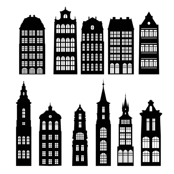 Vector silhouettes of houses — Stock Vector