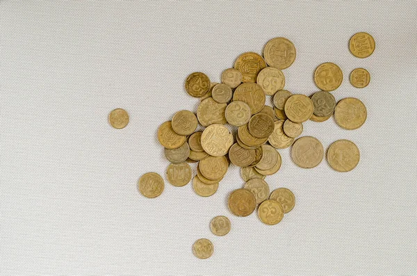 Dirty coins on a light background. — Stock Fotó