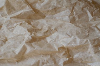 Buruşmuş iz sürme kağıdı. Yakın plan. Kağıdın dokusu. Çeşitli tasarım görevlerinin temeli. Tam kare. Seçici odak.