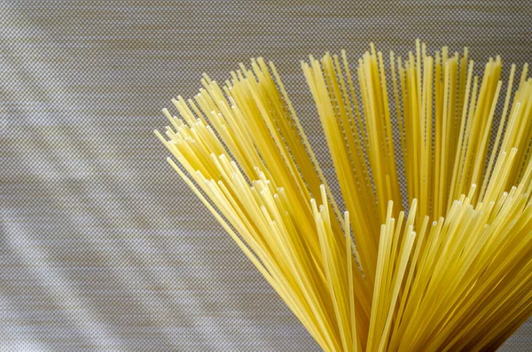 Spaghetti Beige Background Bunch Spaghetti Close Group Dry Spaghetti Unprepared — Stock Photo, Image