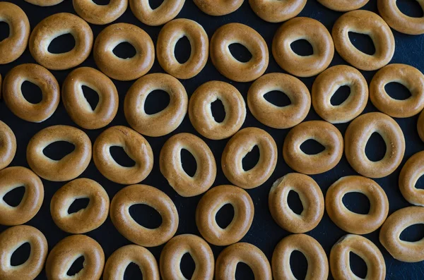 Couche Bagels Sur Fond Texturé Noir Groupe Friandises Sucrées Pour — Photo