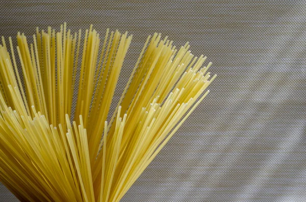 Spaghetti Beige Background Bunch Spaghetti Close Group Dry Spaghetti Unprepared — Stock Photo, Image