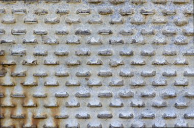 Eski delikli metal yakın plan. Paslı levha metali. Soyut arkaplan. Bir odak seç.