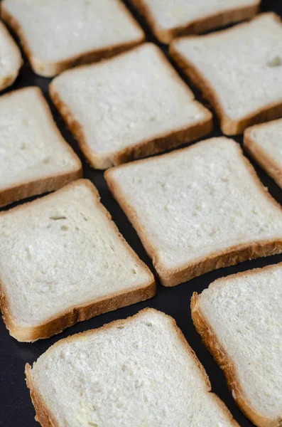 Fundo Pão Sanduíche Pedaços Pão Dispostos Numa Fila Concentre Primeiro — Fotografia de Stock