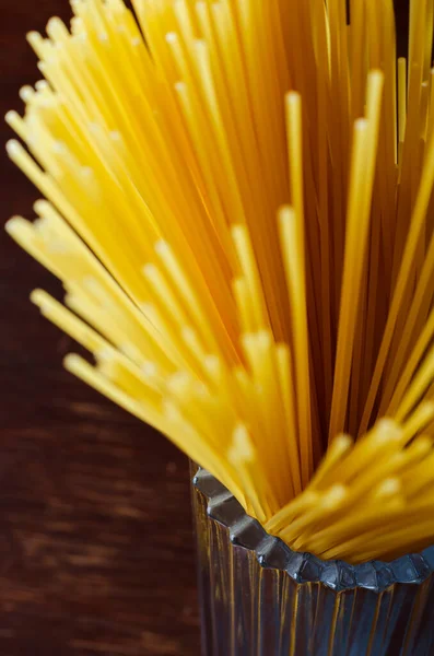 Spaghetti Glass Cup Brown Wooden Table Bunch Spaghetti Close Group — Stock Photo, Image