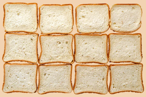 Тост Хлібний Фон Дванадцять Шматків Нарізаного Хліба Світло Бежевому Фоні — стокове фото
