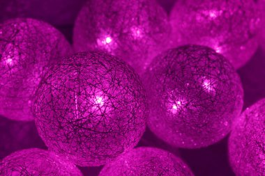 Background from luminous balls of violet color.
