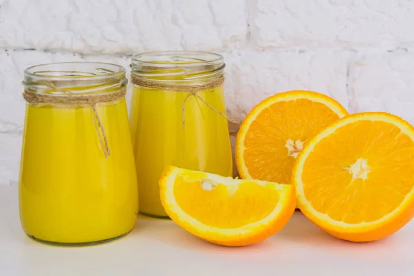 Two Jars Fresh Orange Juice White Background Close — Stock Photo, Image