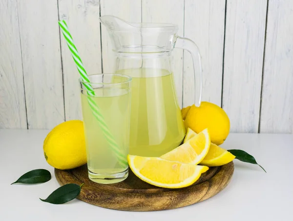 Jug Fresh Lemon Juice White Wooden Background — Stock Photo, Image