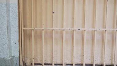 observation post in prison. metal bars on the windows of prison guards place