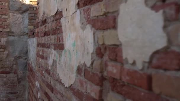 Dilapidated brick wall in an old house — Stock Video