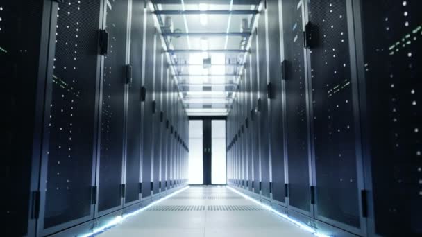 Camera Moves Through Big Working Data Center with Server Racks and Glass Ceiling. — Stock Video