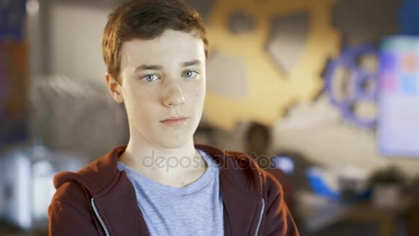 Smart Boy Looks into Camera. In the Background Computer Science School Class. — Stock Video