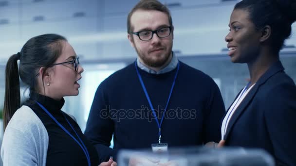 Multi Ethnic Team of Male and Female Leading Scientists Work on Innovative Robotics Technology. They Work in a Modern Laboratory/ Research Center. — Stock Video