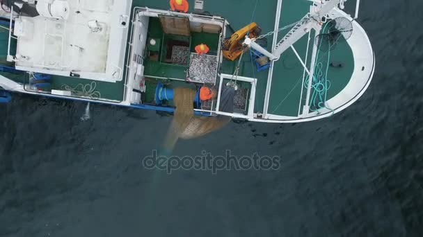 Flying over a Commercial Ship Fishing with Trawl Net at the Sea. — Stock Video