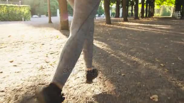 Young Woman and Man Running Together Forward Outwards Camera in Bright Sunny Day — Stock Video