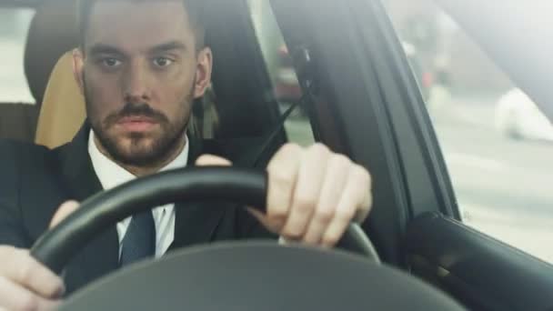 Businessman Driving a Car in Business District. — Stock Video