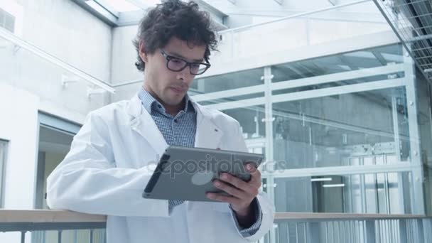 Latin Ethnicity Student of Medical School using Tablet Computer in Hallway — Stock Video