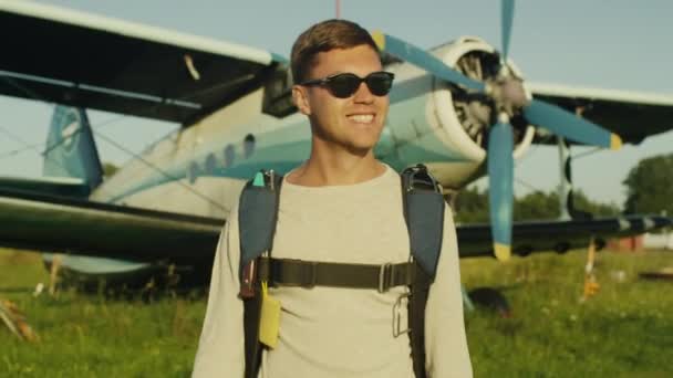 Man in Sunglasses is Walking on Airfield — Stock Video