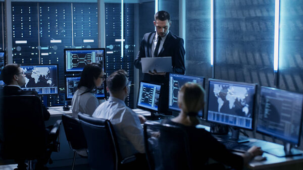 Professional IT Engineers Working in System Control Center Full 
