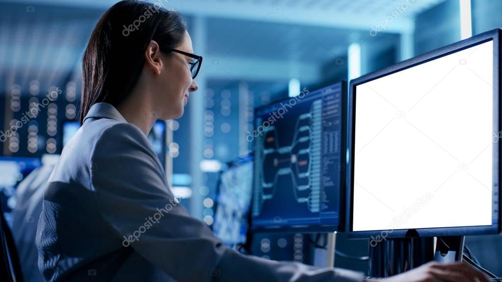 Close up Shot of Female Engineer Controller Observes Working of 