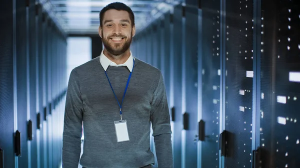 Portrait of an IT Engineer, he Smiles and Folds His Arms on a Ch — Stock Photo, Image