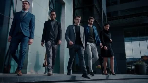 Multicultural Diverse Office Managers and Business People Walking in Front on the Camera. They Look Smart and Successful. Pedestrians are Dressed Smartly. Business Department Walking in Downtown. — Stock Video