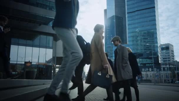 Diverse and Multicultural Office Managers and Business People Commute to Work in the Morning or from Office on a Cloudy Day on Foot. Pedestrians are Smart Casually Dressed. People Using Smartphones. — Stock Video