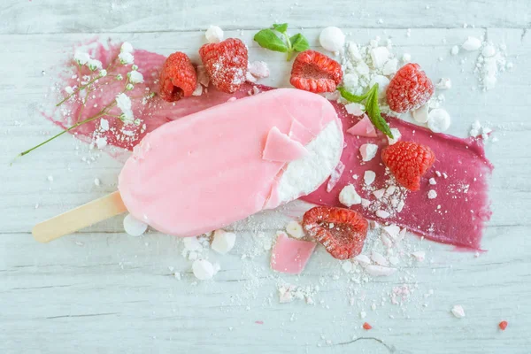 Raspberry ice cream on wooden table — Stock Photo, Image