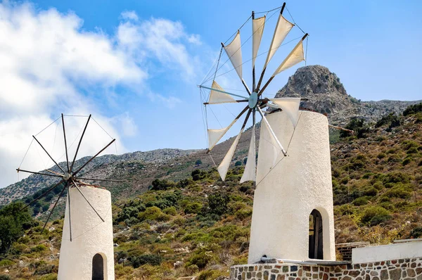 White windmills at Homo sapiens museum in Lassithi district on Crete island, Greece — Stock Photo, Image