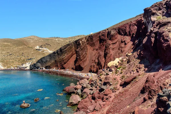 Red beach near volcanic rocks on Santorini island, Greece