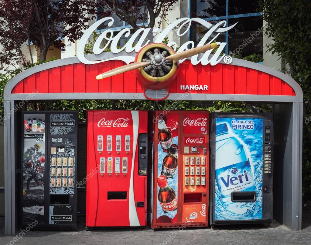 BARCELONA, SPAIN - MAY 2017: Coca-Cola soda drink self-service machines decorated with vintage aircraft propeller