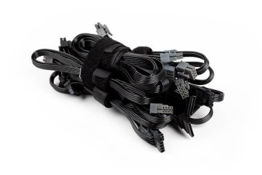 Black modular power supply unit cables set, psu cords put together isolated on white. Many power cables, modern pc assembly parts. Cable management concept, product photo clipart