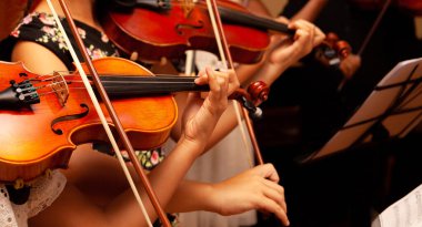 Row, group of anonymous violin players, children, people playing, bows in hands, stands in front, closeup. Classical music concert simple performance kids orchestra string section / quartet performing clipart